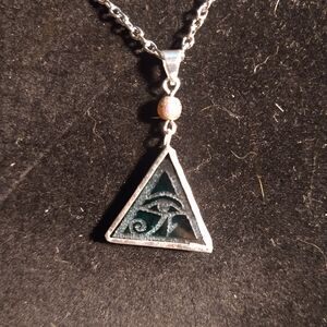Stained glass eye of Horus pendant